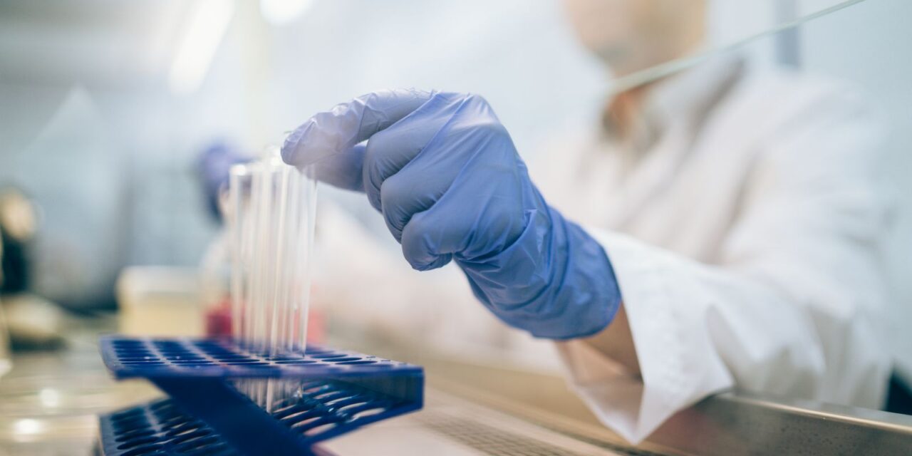 Laboratory quality testing with gloved hands