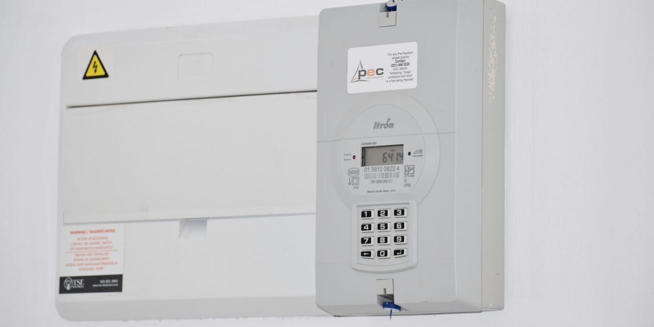 Electrical meter and distribution box mounted on a white wall in Cape Town