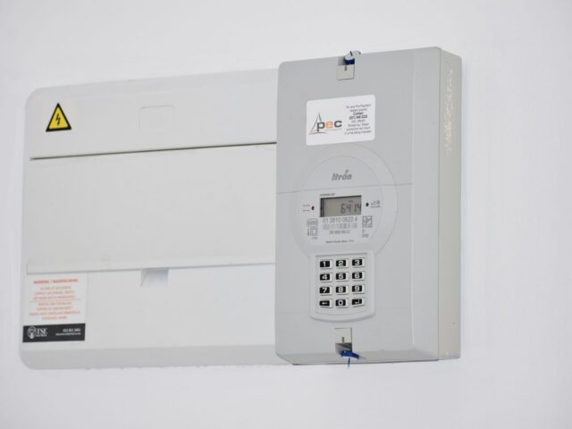 Electrical meter and distribution box mounted on a white wall in Cape Town